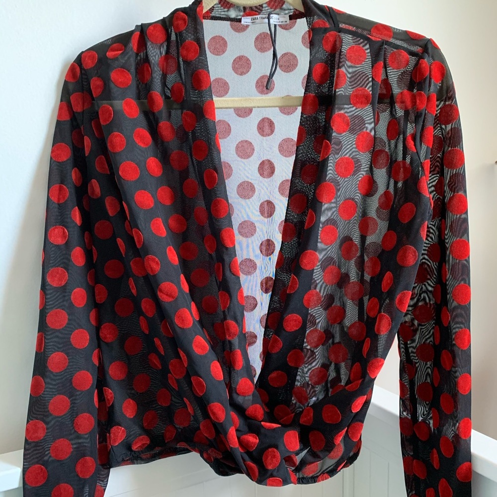 Sheer polka dot crossover top